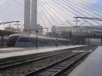Imagine atasata: A sunny day with rain over Desiro SR 20 and Bucharest North Railway Station.jpg